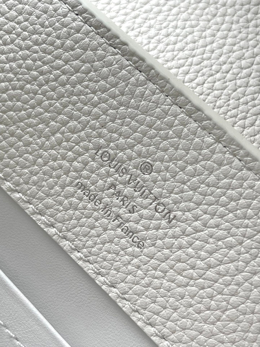 LOUIS VUITTON CAPUCINES EAST-WEST 33 IN WHITE CALFSKIN SILVER HARDWARE