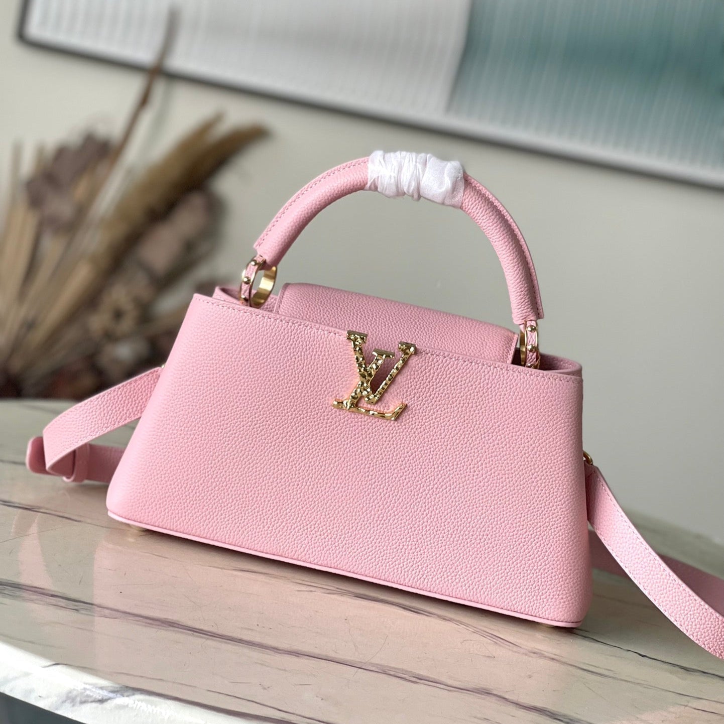 LOUIS VUITTON CAPUCINES EAST-WEST 33 IN BLUSH PINK CALFSKIN GOLD HARDWARE