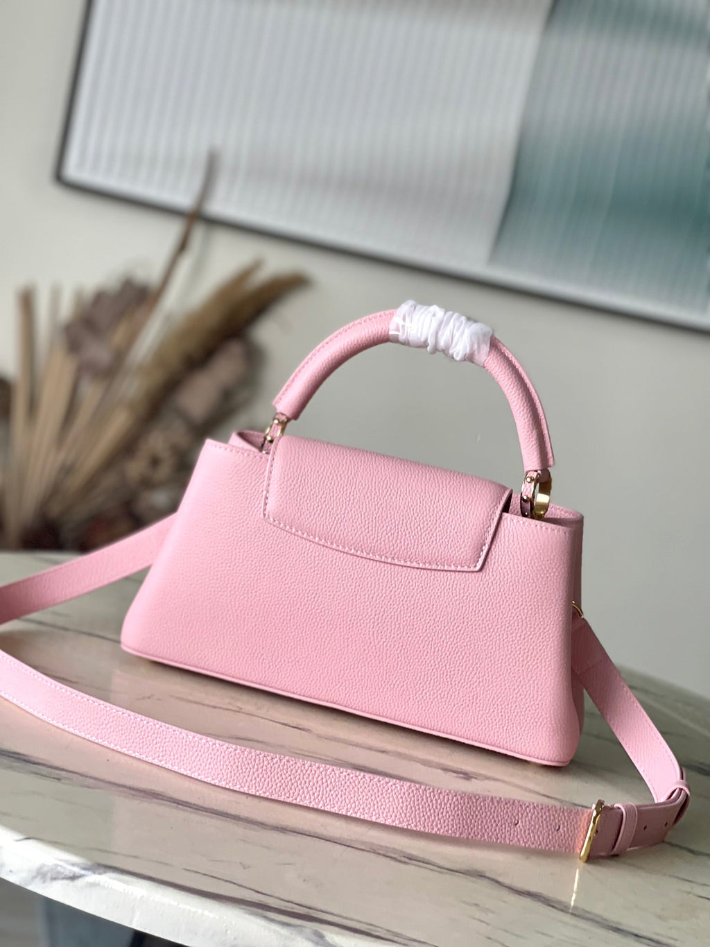 LOUIS VUITTON CAPUCINES EAST-WEST 33 IN BLUSH PINK CALFSKIN GOLD HARDWARE