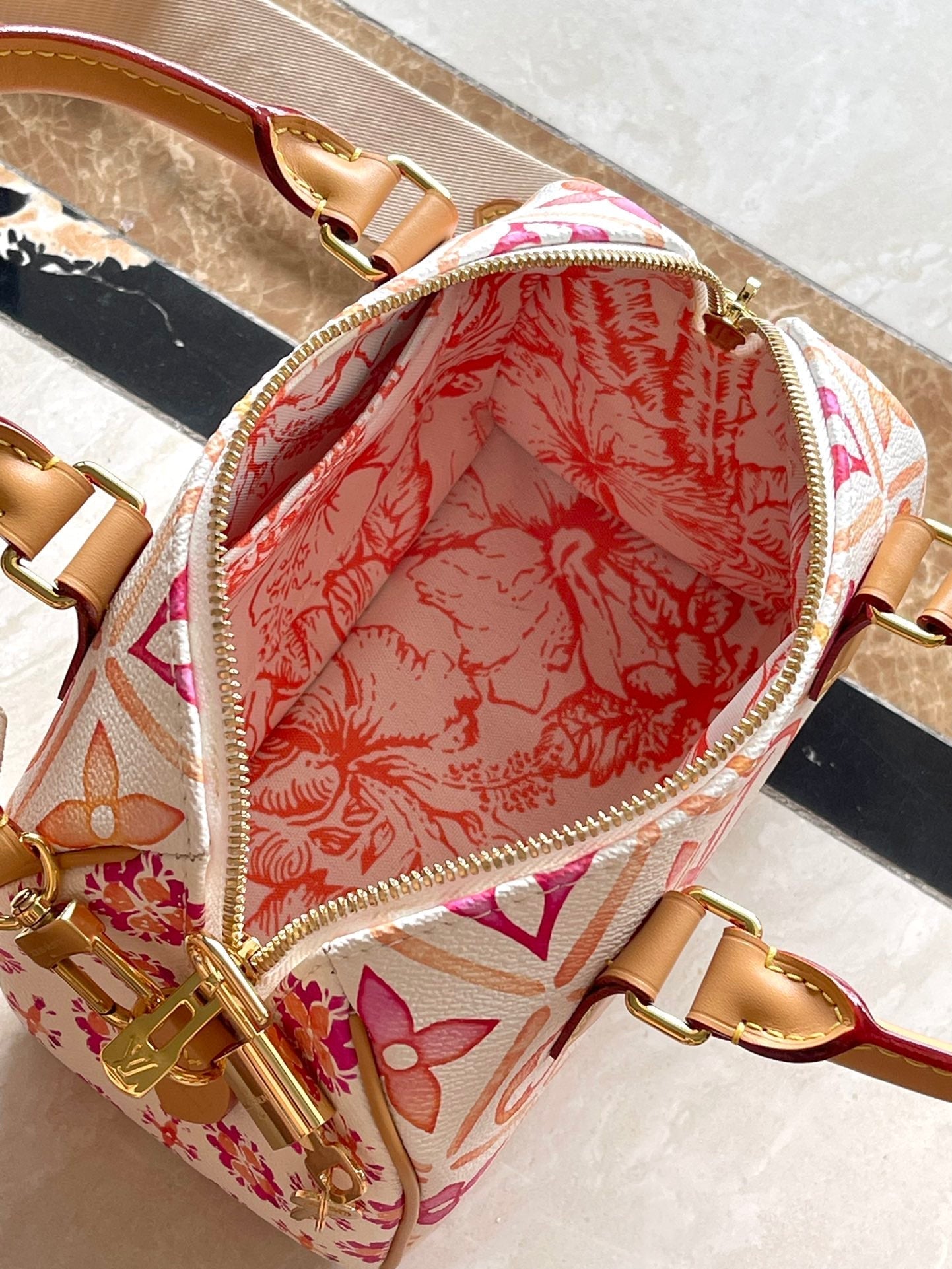 LOUIS VUITTON SPEEDY BANDOULIÈRE 20 IN CORAL MONOGRAM TILES CANVAS GOLD BUCKLE