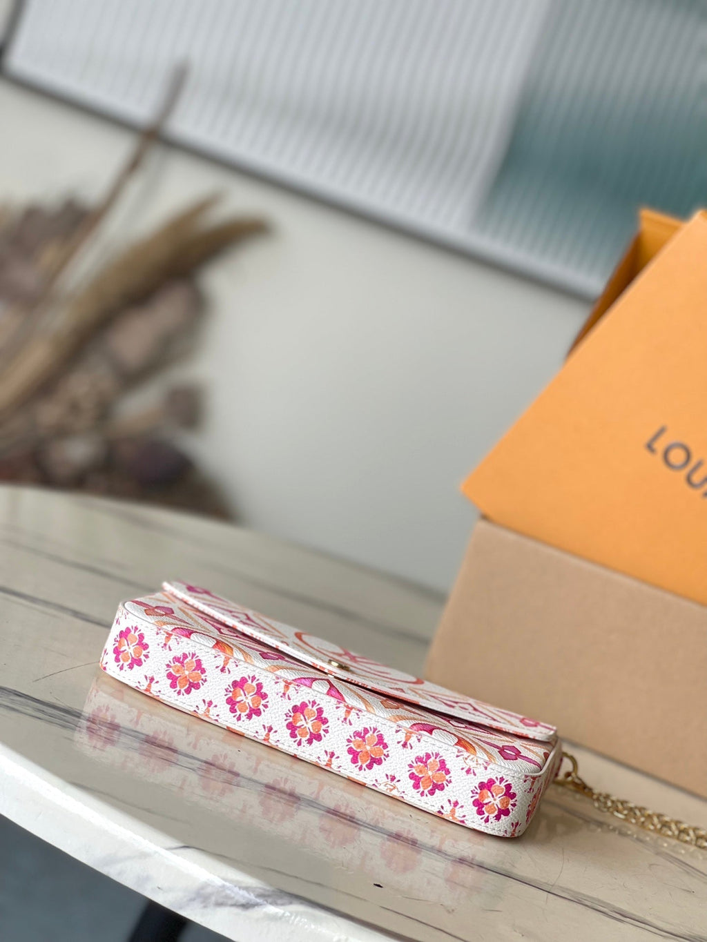 LOUIS VUITTON FÉLICIE POCHETTE 21 IN CORAL MONOGRAM TILES CANVAS