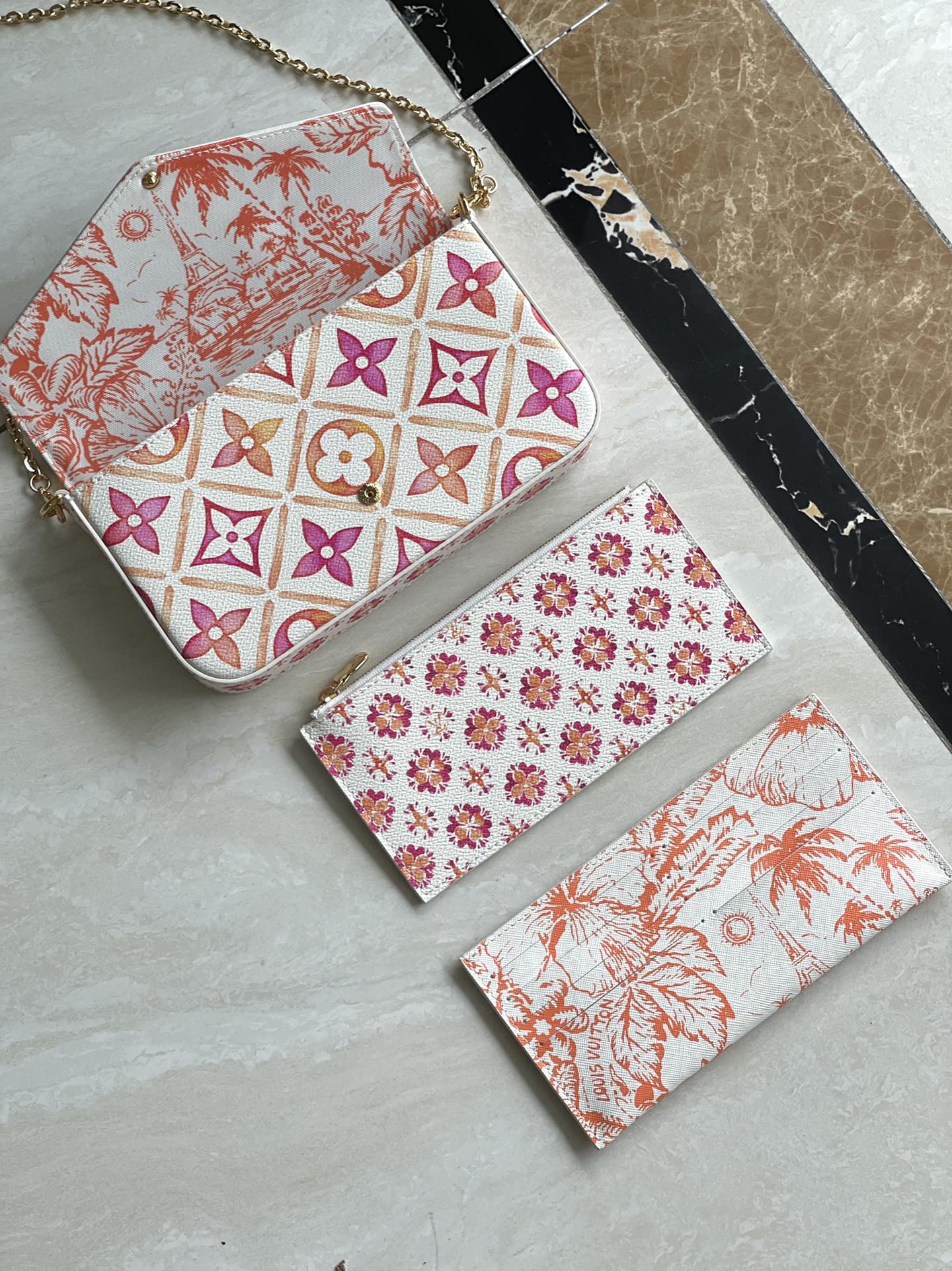 LOUIS VUITTON FÉLICIE POCHETTE 21 IN CORAL MONOGRAM TILES CANVAS