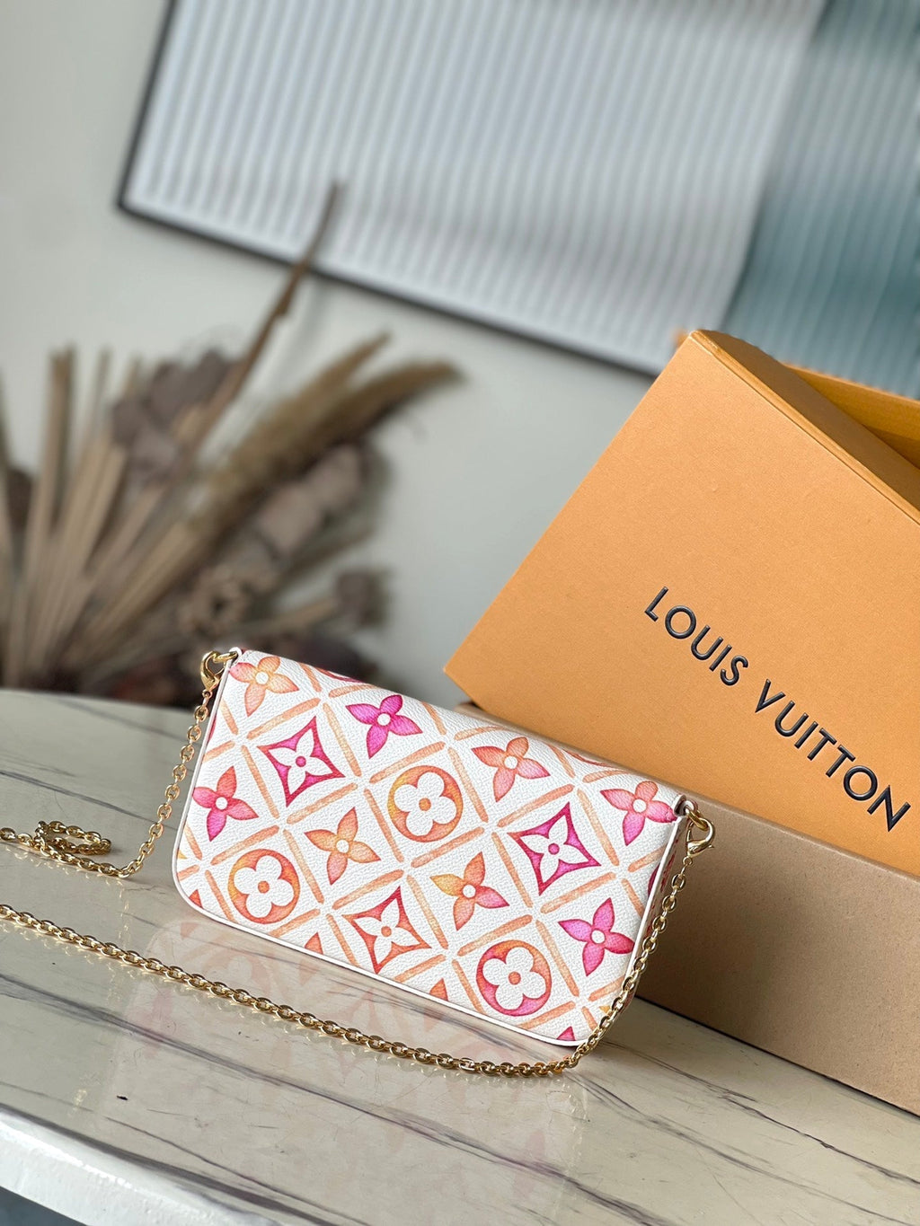LOUIS VUITTON FÉLICIE POCHETTE 21 IN CORAL MONOGRAM TILES CANVAS