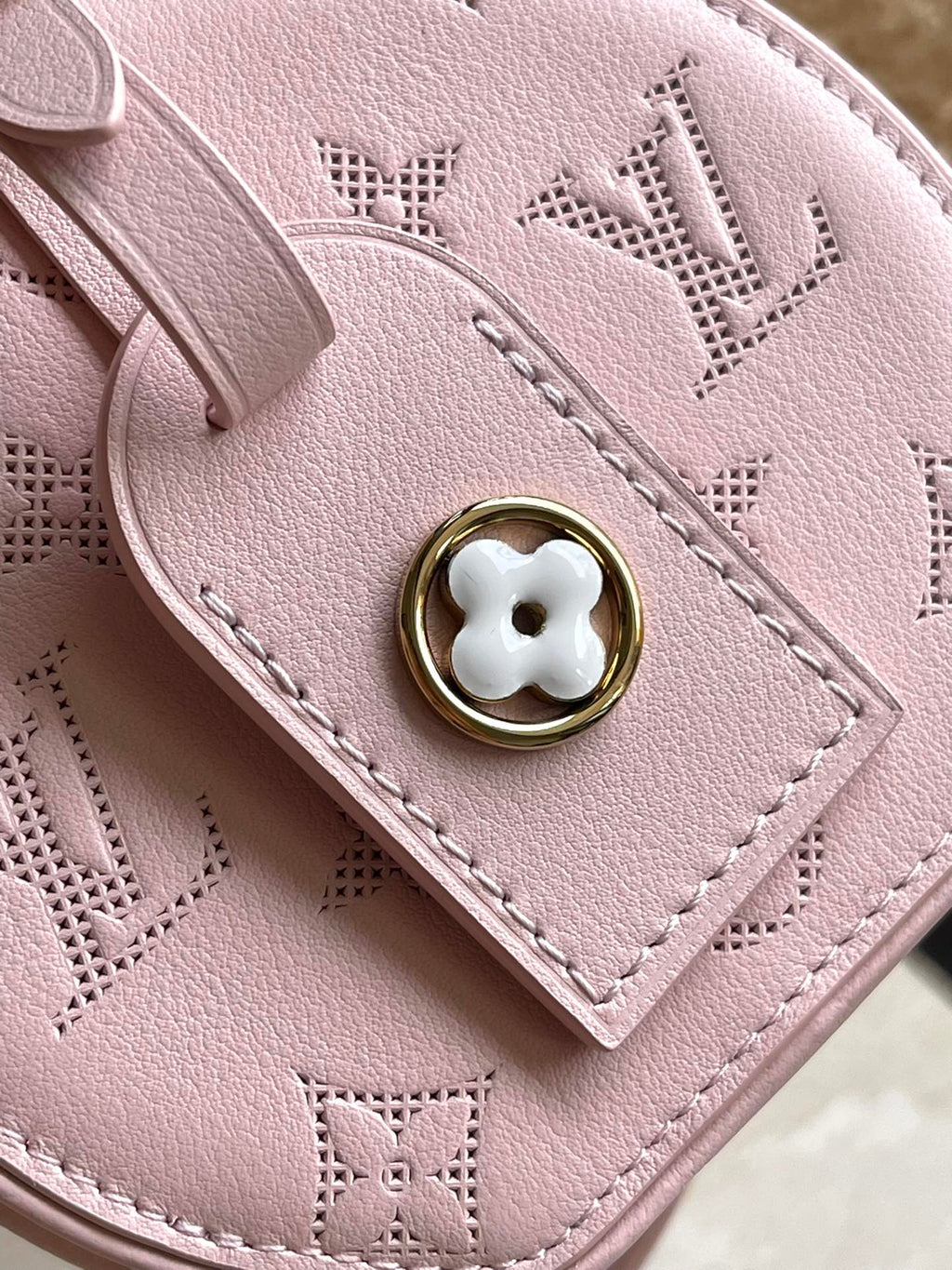 LOUIS VUITTON MINI BOITE CHAPEAU 13 IN LIGHT PINK MONOGRAM PERFORATED CALFSKIN