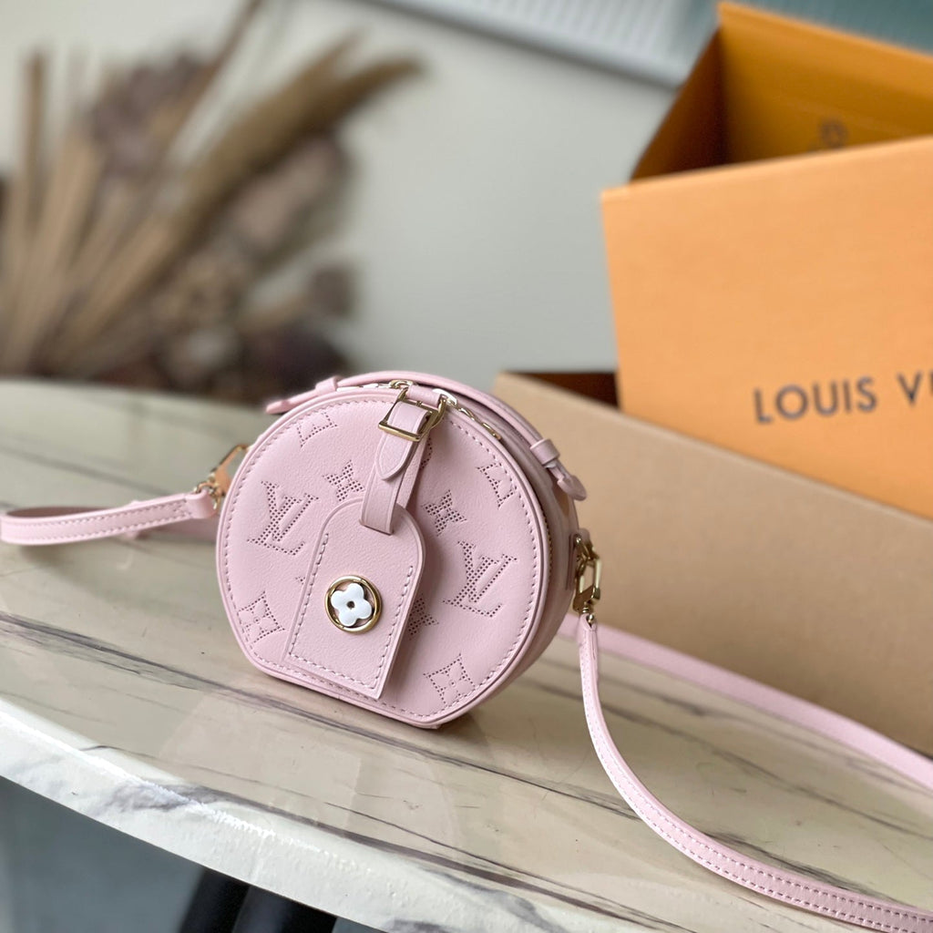 LOUIS VUITTON MINI BOITE CHAPEAU 13 IN LIGHT PINK MONOGRAM PERFORATED CALFSKIN