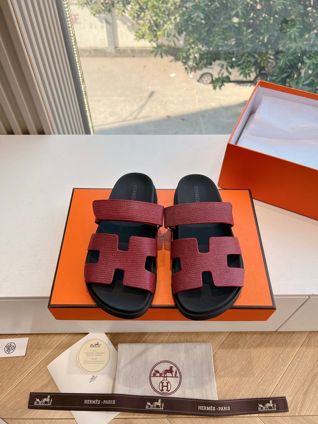 HERMES CHYPRE SANDAL IN CURRANT RED SHINY GRAINED CALFSKIN