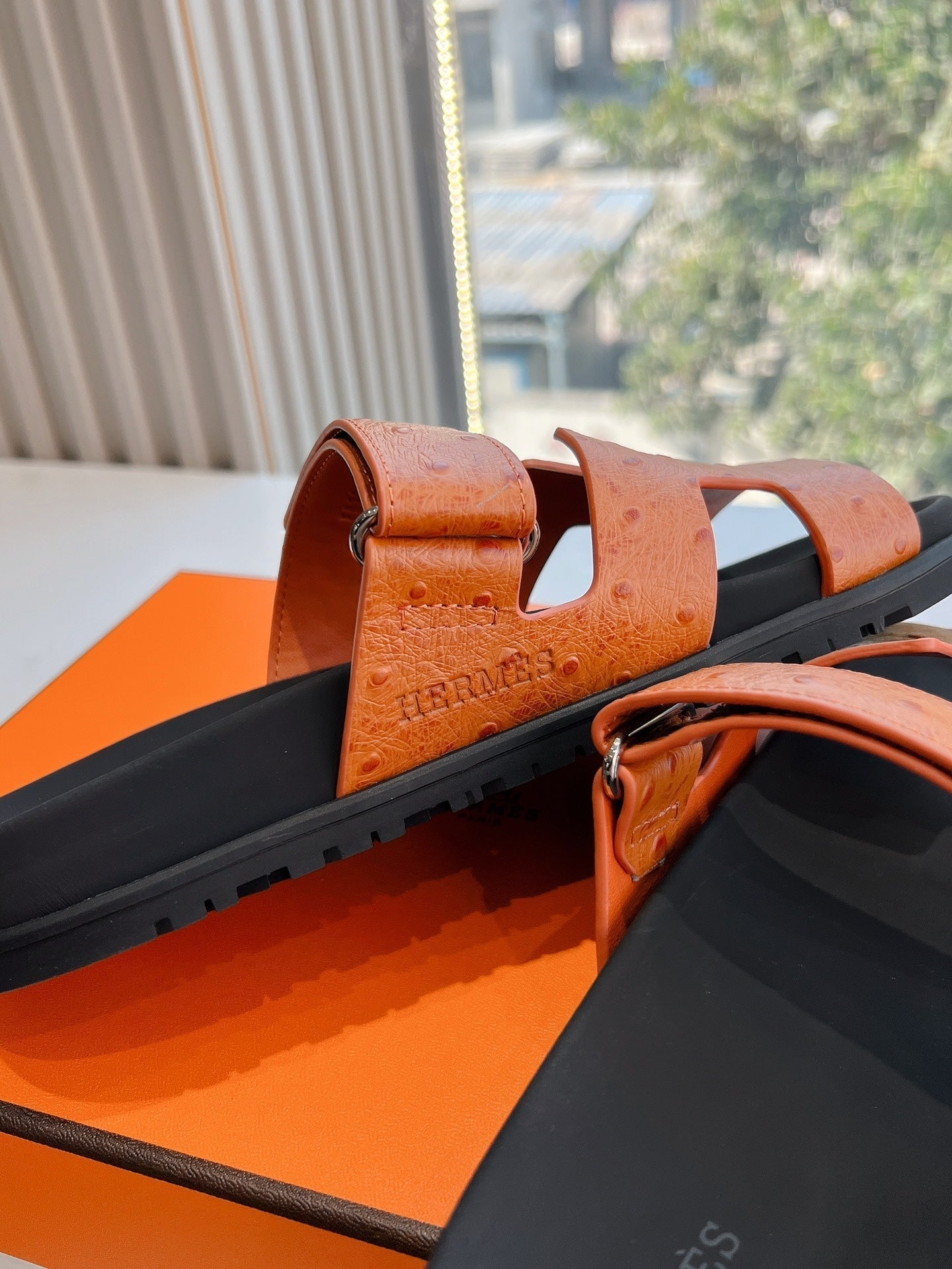 HERMES CHYPRE SANDAL IN VIVID ORANGE GRAINED CALFSKIN