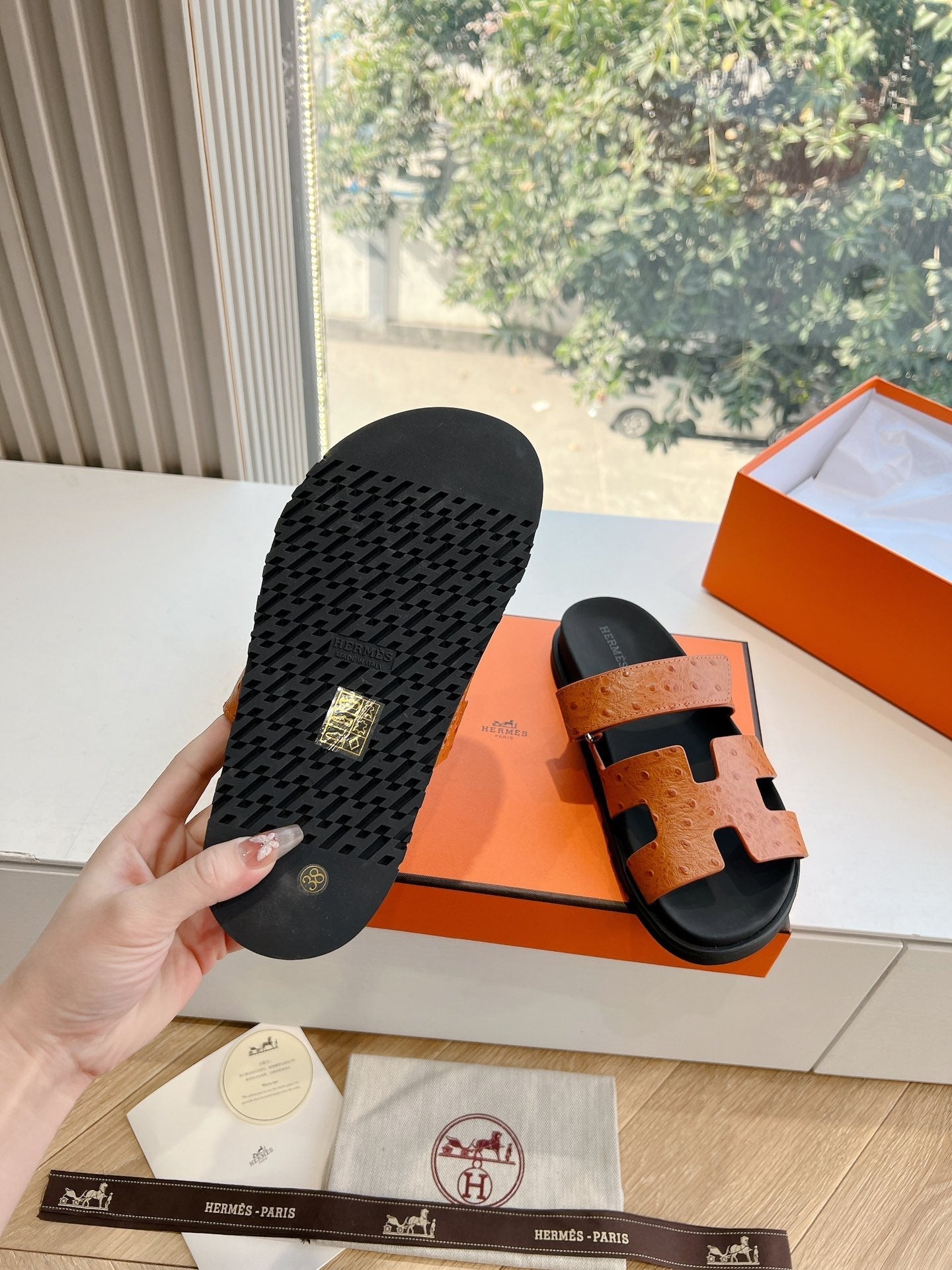 HERMES CHYPRE SANDAL IN VIVID ORANGE GRAINED CALFSKIN