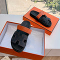 HERMES CHYPRE SANDAL IN BLACK DENIM AND VIVID ORANGE CALFSKIN