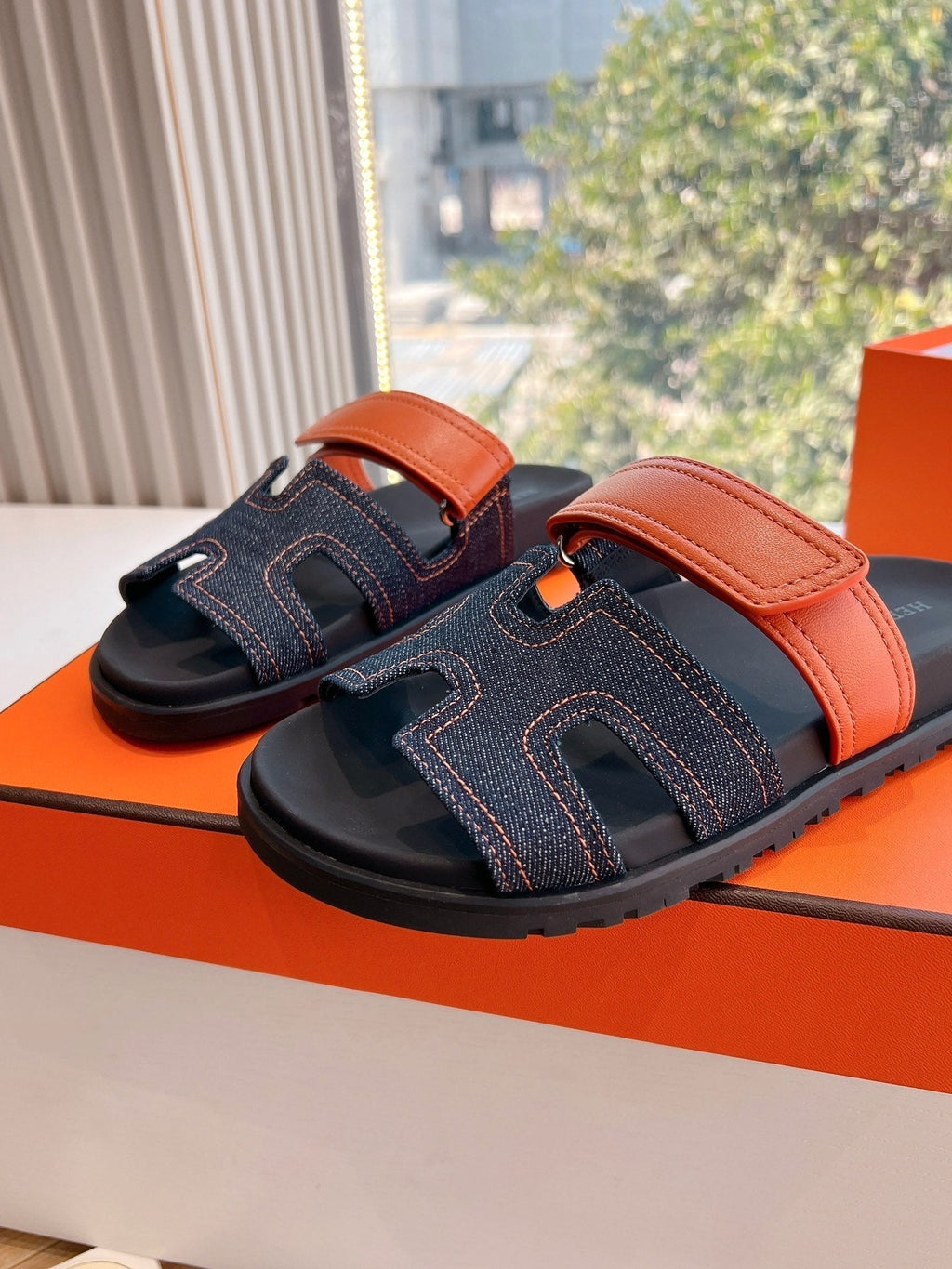 HERMES CHYPRE SANDAL IN BLACK DENIM AND VIVID ORANGE CALFSKIN