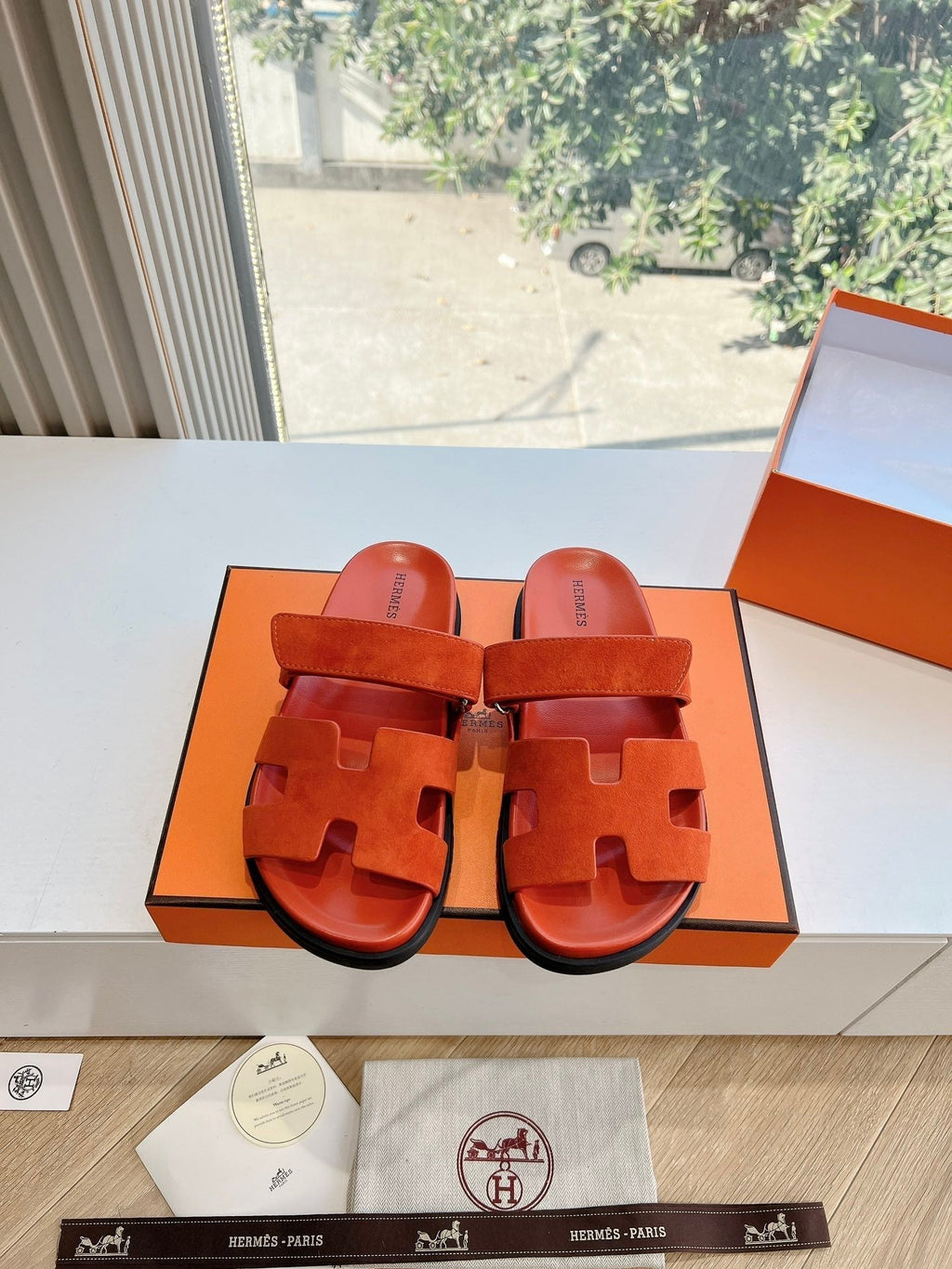 HERMES CHYPRE SANDAL IN FIRE ORANGE SUEDE
