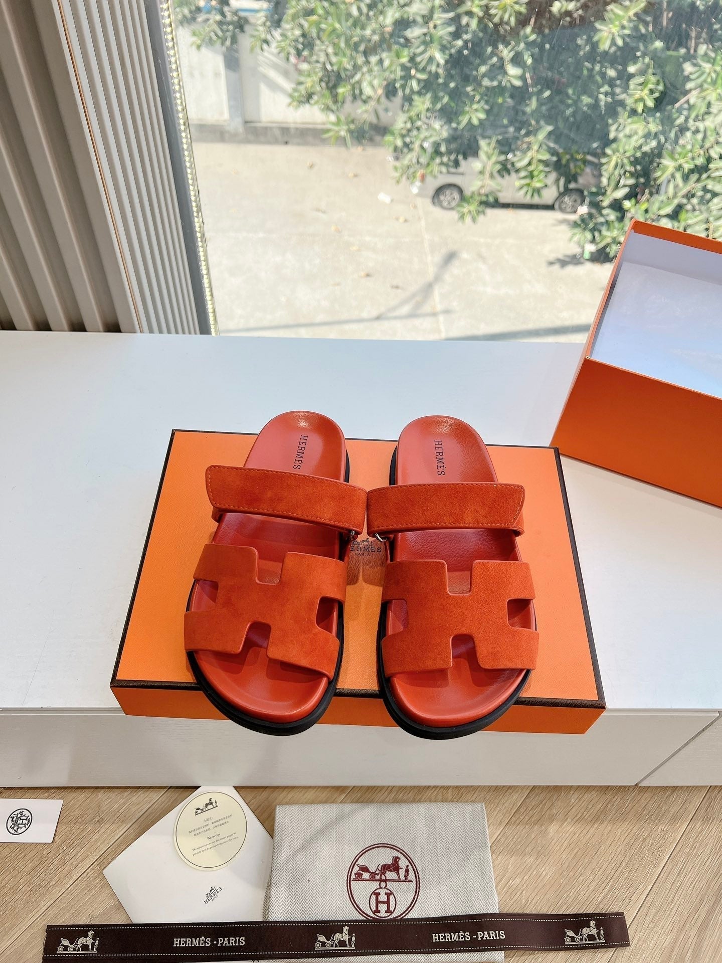 HERMES CHYPRE SANDAL IN FIRE ORANGE SUEDE