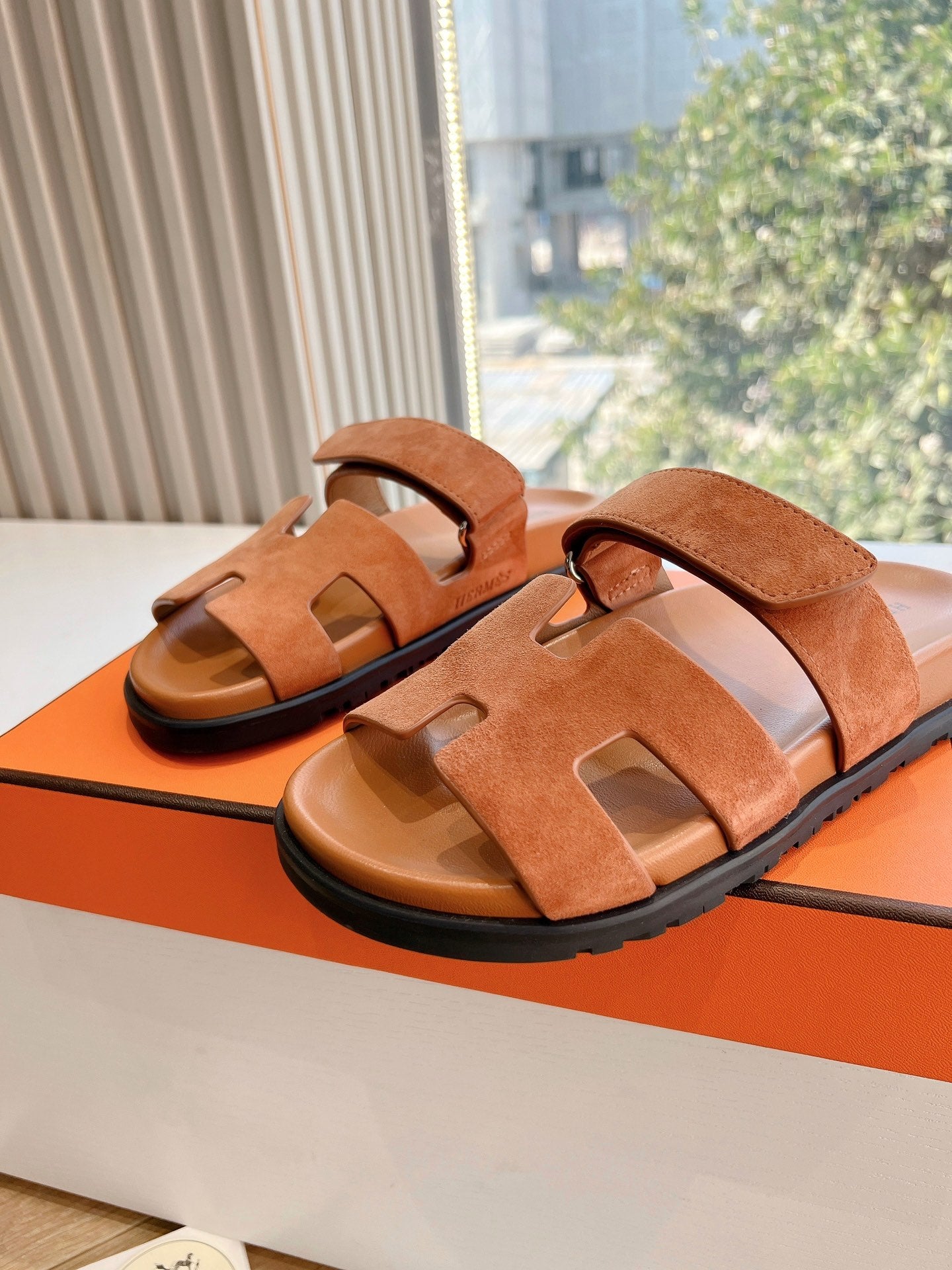 HERMES CHYPRE SANDAL IN VIVID ORANGE SUEDE