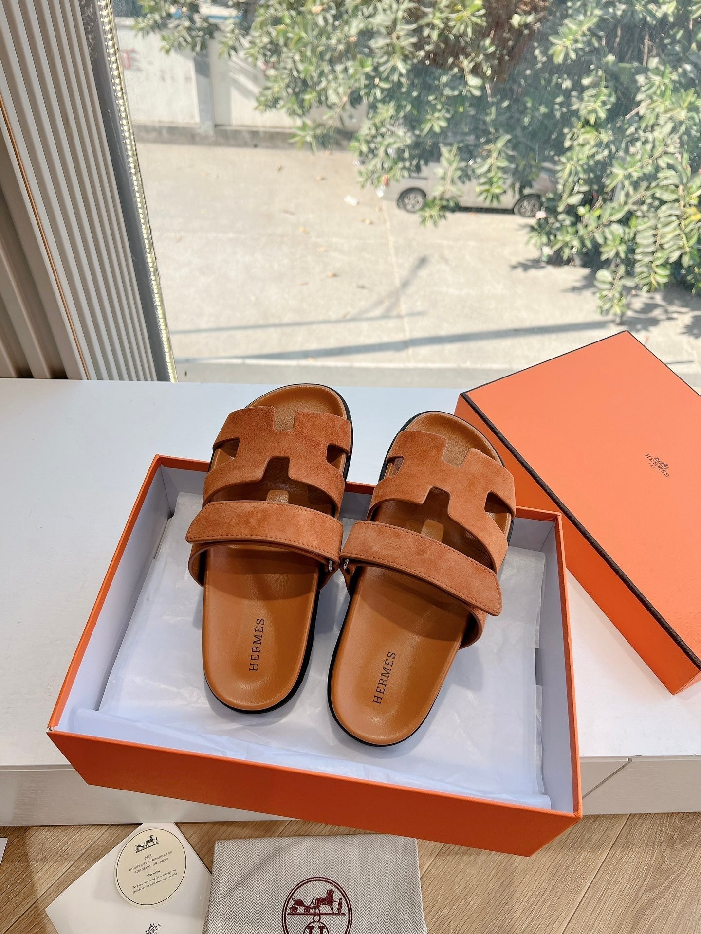 HERMES CHYPRE SANDAL IN VIVID ORANGE SUEDE