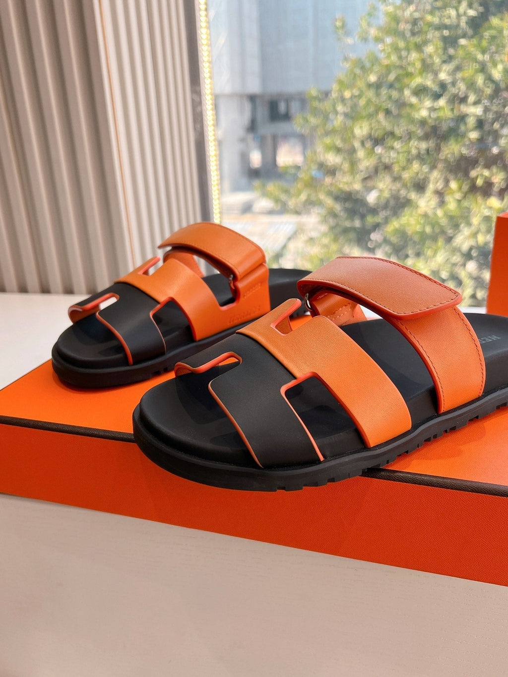HERMES CHYPRE SANDAL IN VIVID ORANGE MIX BLACK CALFSKIN