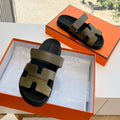 HERMES CHYPRE SANDAL IN ARMY GREEN SUEDE AND CALFSKIN