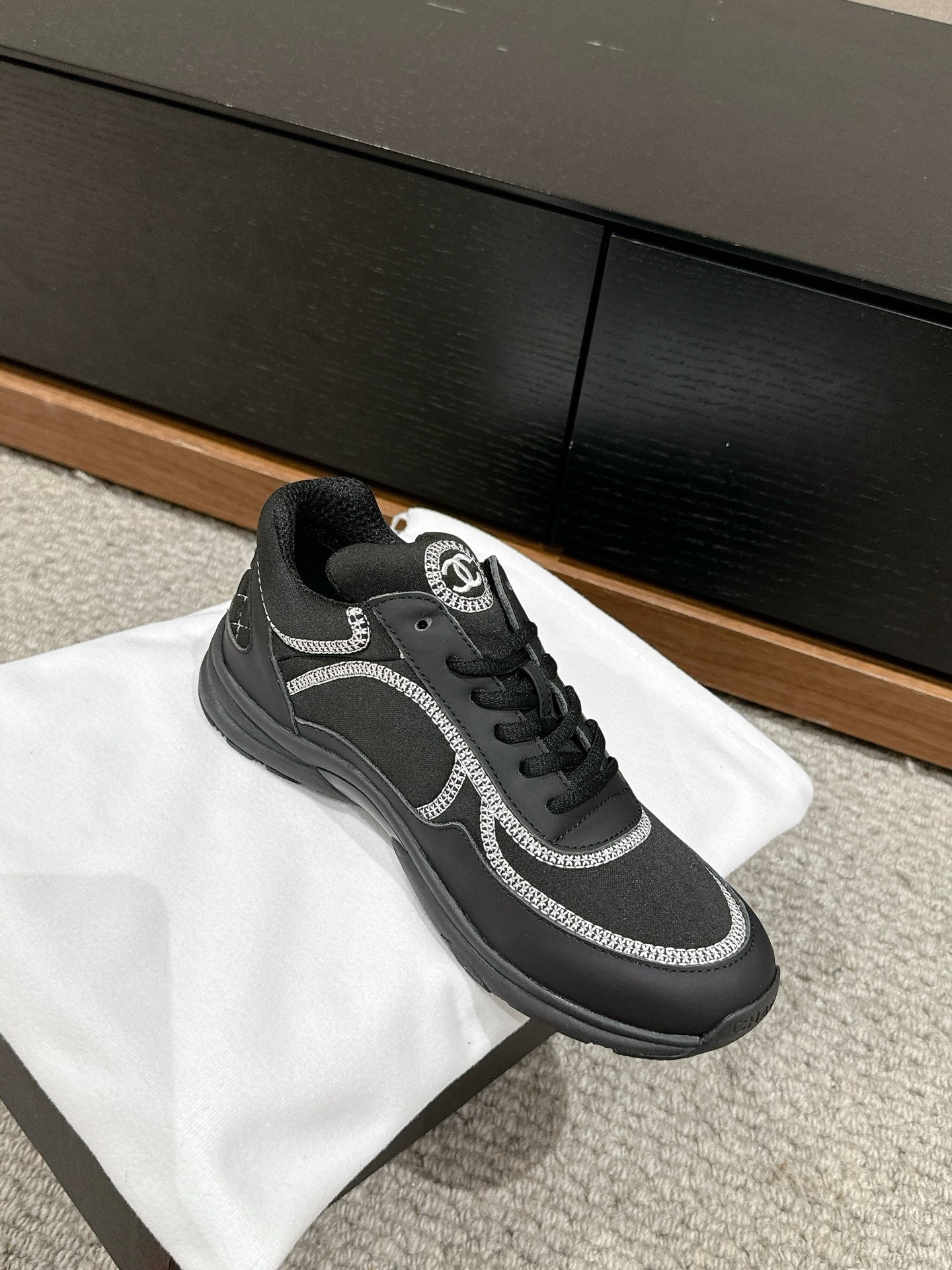 CHANEL CLASSIC TRAINER IN BLACK FABRIC