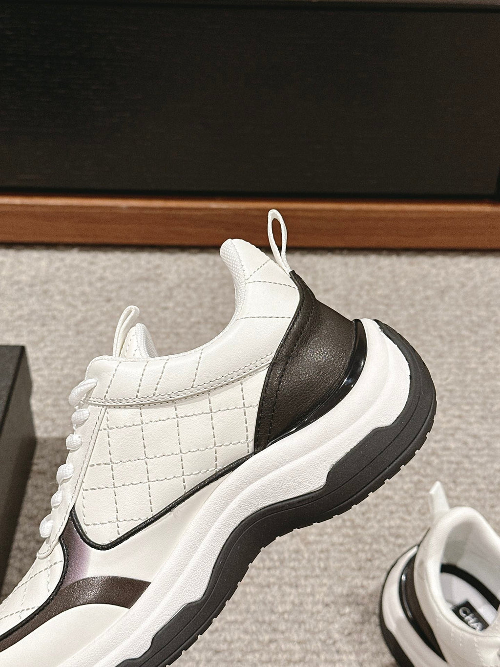 CHANEL CLASSIC SNEAKER IN WHITE MIX BLACK LAMBSKIN