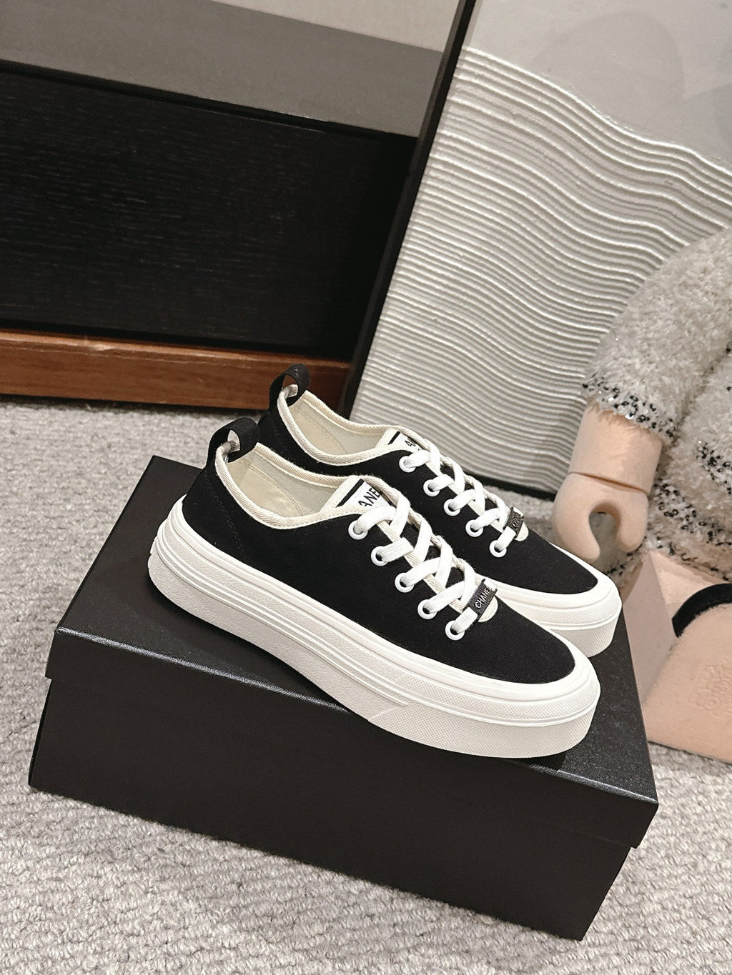 CHANEL LACE-UP SNEAKERS IN BLACK CANVAS