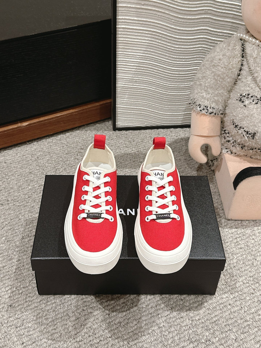 CHANEL LACE-UP SNEAKERS IN CHERRY RED CANVAS