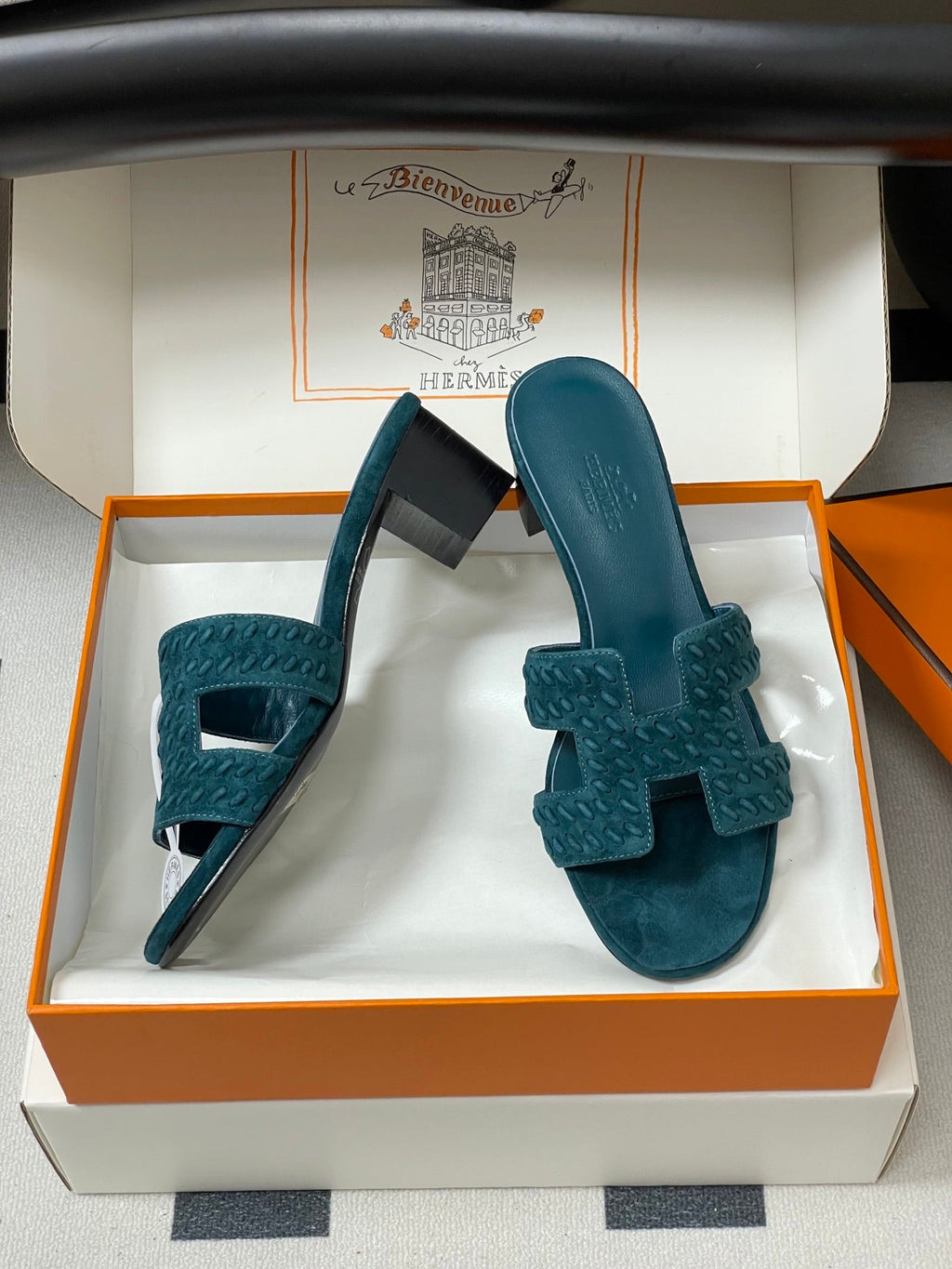 HERMES 25S ORAN HIGH‑HEEL SANDAL IN DARK BLUE SUEDE AND LAMBSKIN