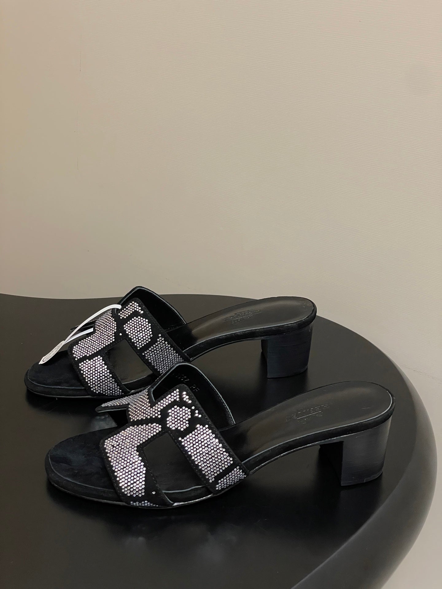 HERMES 25S ORAN HIGH‑HEEL SANDAL 50 MM IN BLACK LAMBSKIN WITH WHITE STONE DETAILS