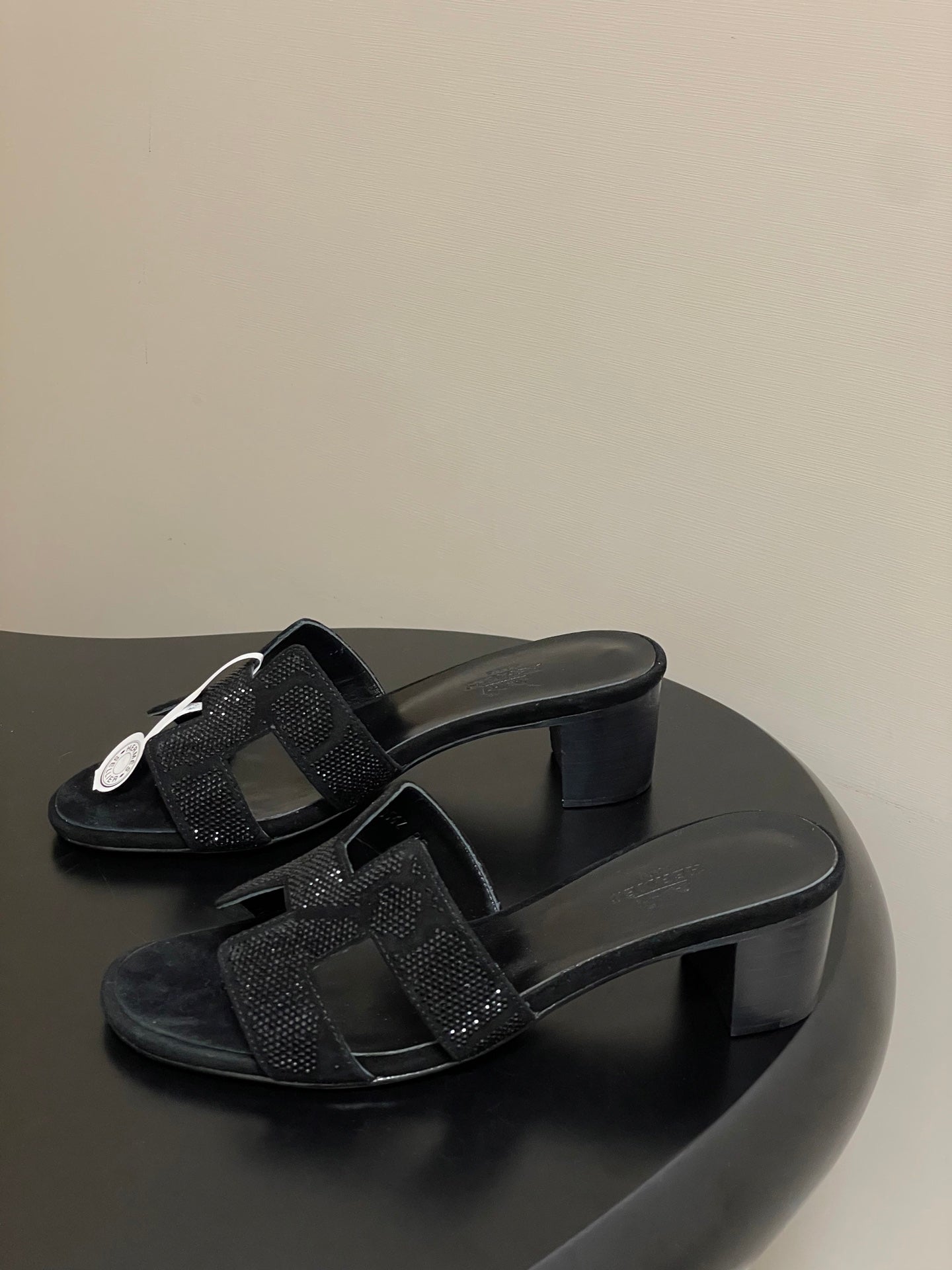 HERMES 25S ORAN HIGH‑HEEL SANDAL 50 MM IN BLACK LAMBSKIN WITH STONE DETAILS