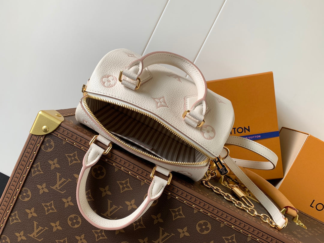 LOUIS VUITTON SPEEDY BANDOULIÈRE 21 IN WHITE AND PINK MONOGRAM CANVAS