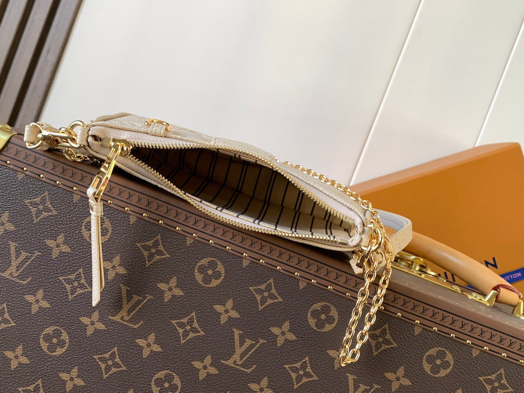 LOUIS VUITTON EASY POUCH ON STRAP 19 IN BEIGE MONOGRAM EMPREINTE LEATHER