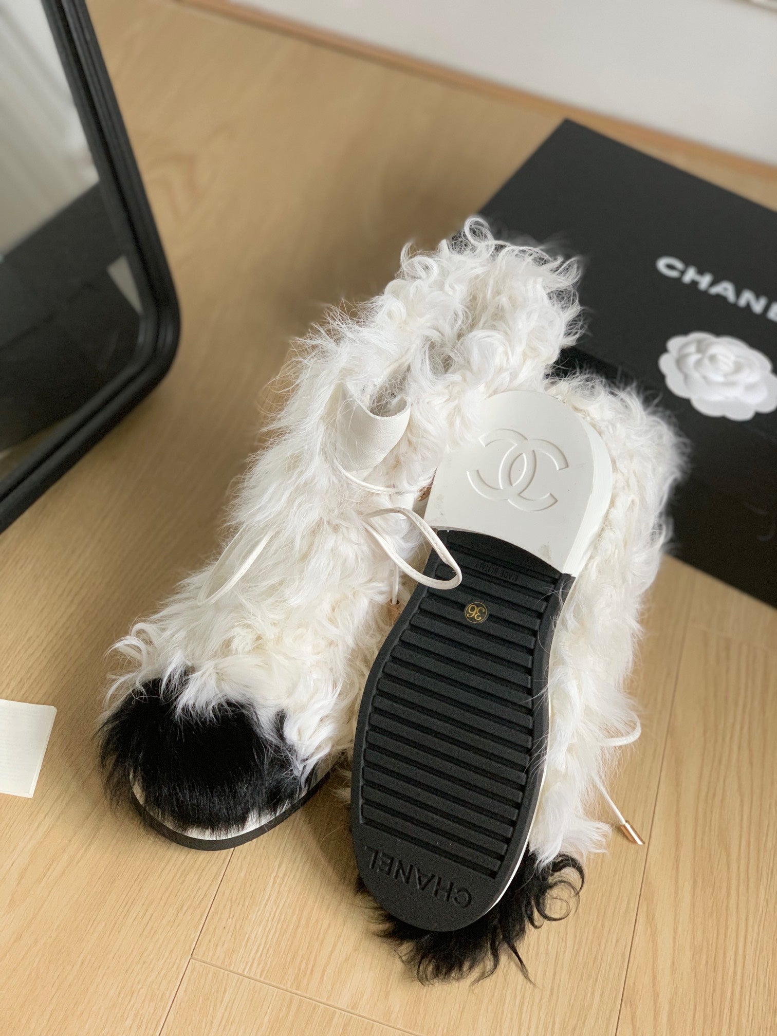 CHANEL ANKLE BOOTS IN WHITE MIX BLACK WOOL FUR