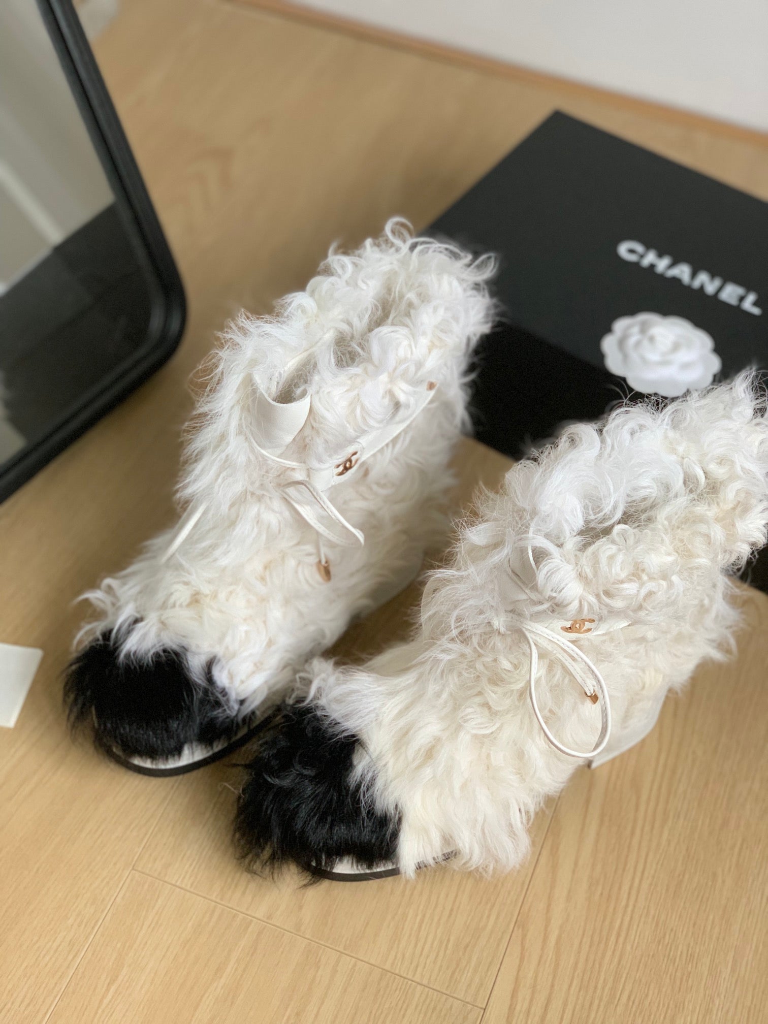 CHANEL ANKLE BOOTS IN WHITE MIX BLACK WOOL FUR