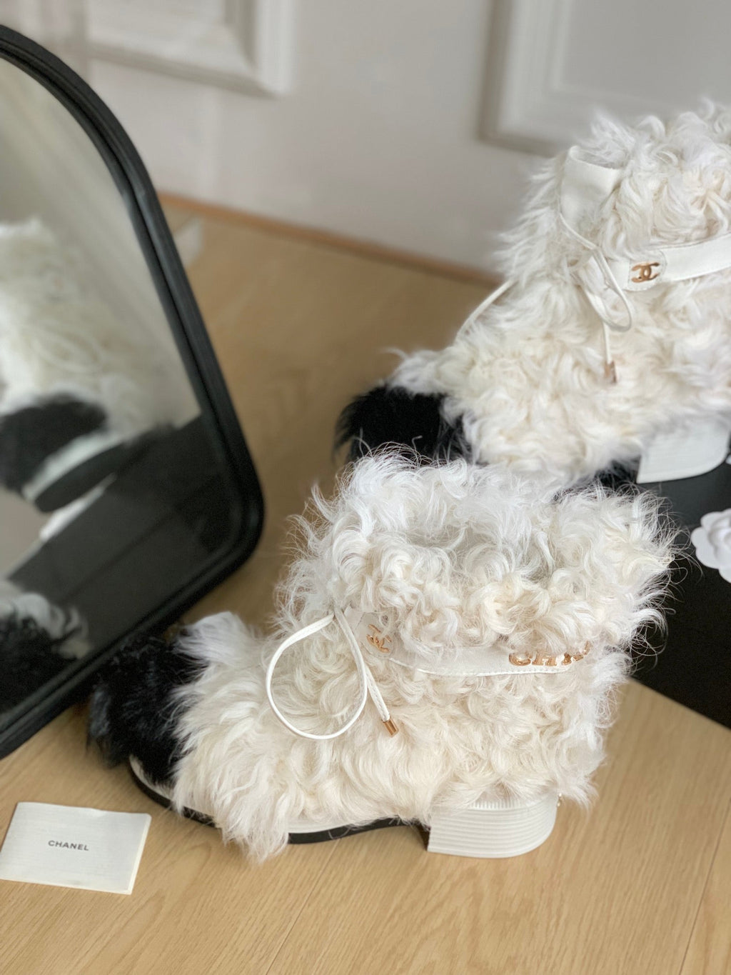 CHANEL ANKLE BOOTS IN WHITE MIX BLACK WOOL FUR