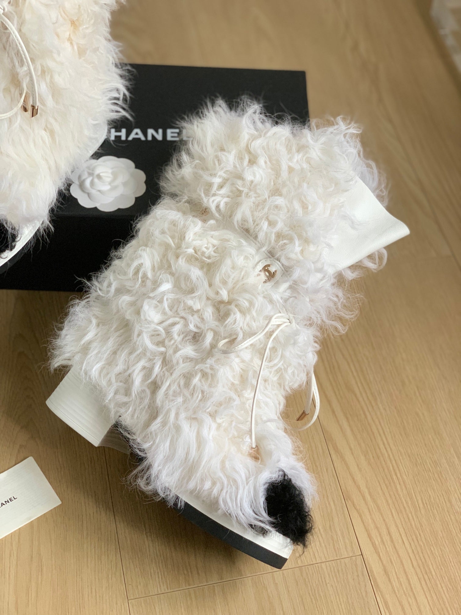 CHANEL ANKLE HIGH BOOTS IN WHITE MIX BLACK WOOL FUR
