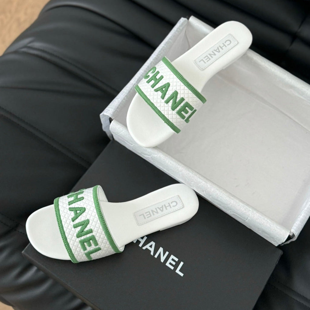 CHANEL Woven Embroidered Letter Slippers White Green