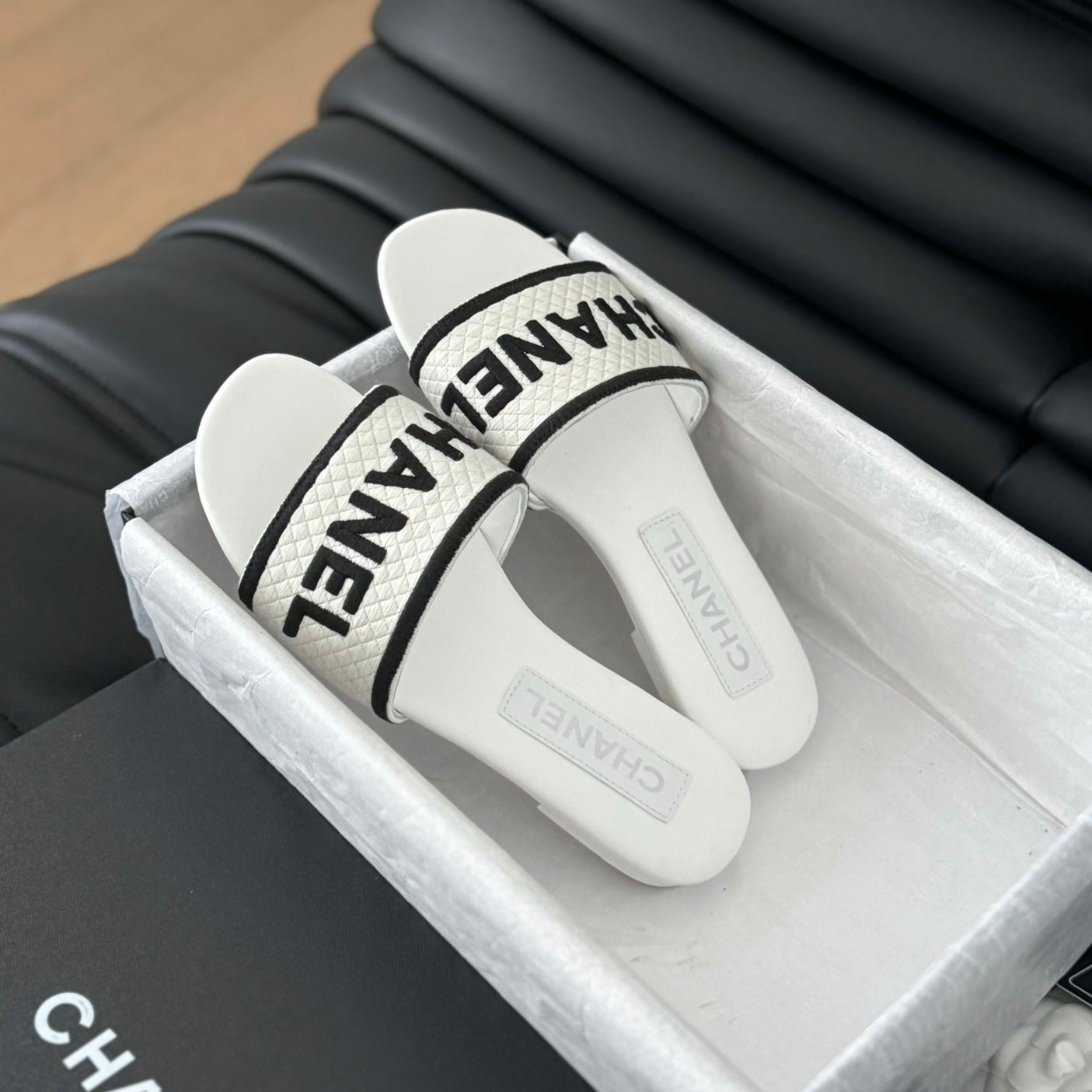 CHANEL Woven Embroidered Letter Slippers White Black