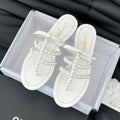 CHANEL MULE SLIPPERS WITH PEARL CHAIN IN WHITE LAMBSKIN