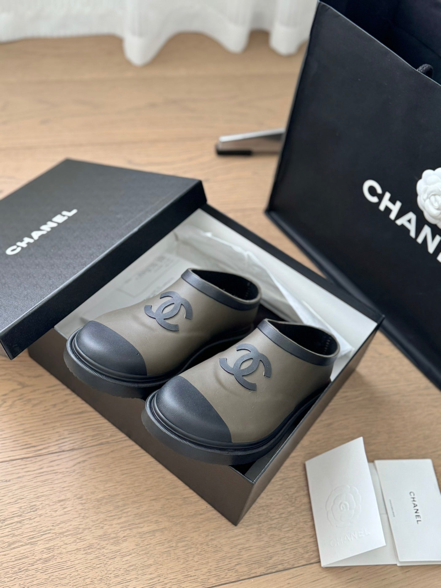 CHANEL SHORT BOOTS IN MOCHA BROWN MIX BLACK RUBBER