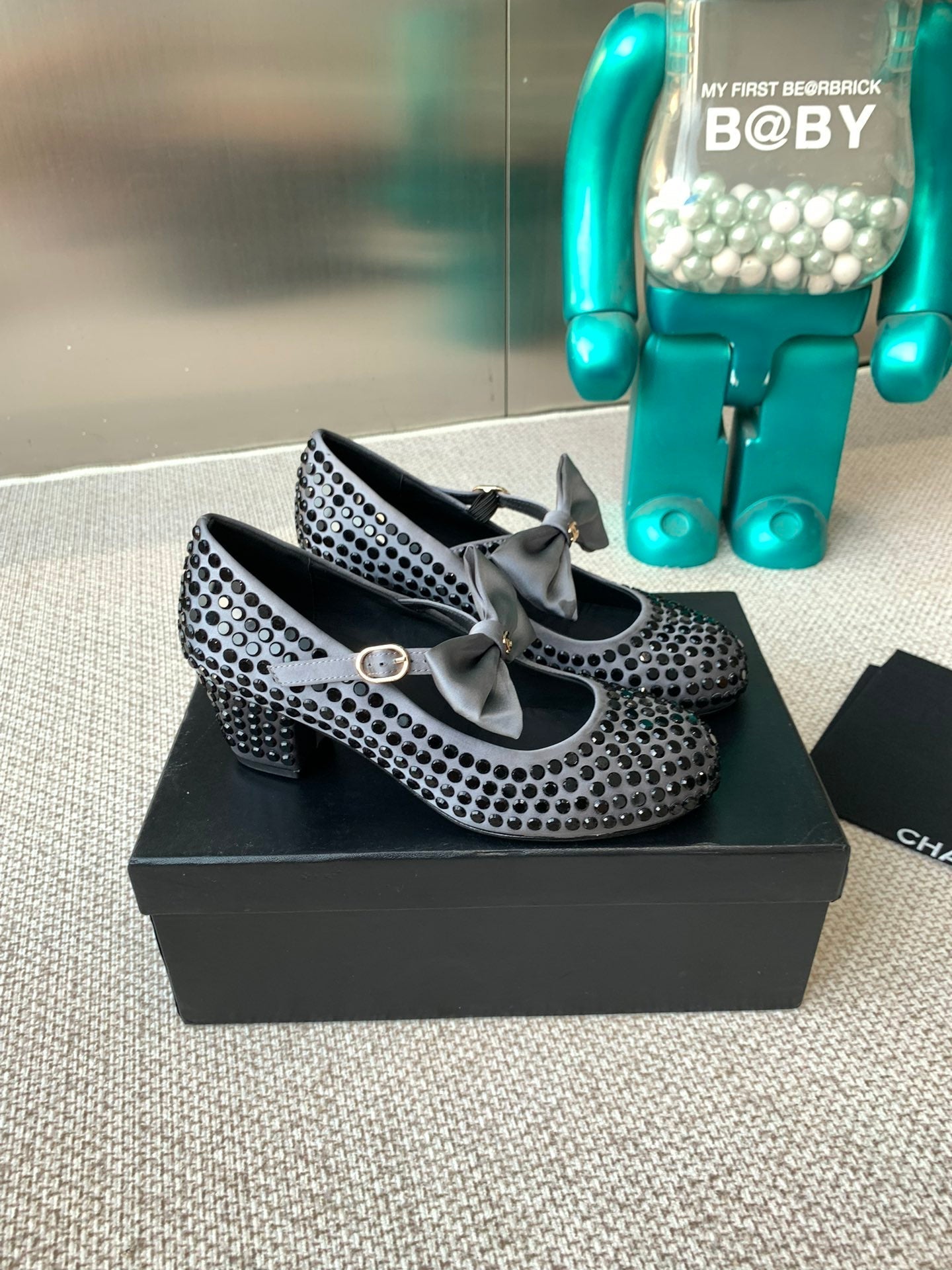 CHANEL MARY JANES SHOES IN STEEL GRAY SATIN WITH BLACK RHINESTONES