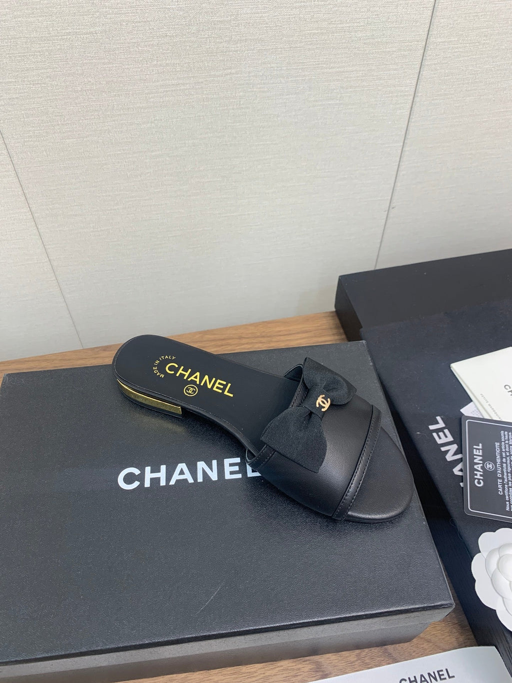 CHANEL BOW SLIPPERS IN BLACK LAMBSKIN