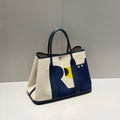 HERMES GARDEN PARTY 36 IN NAVY CREAM TOILE H CANVAS BLUE MARINE CALFSKIN ABSTRACT BEAR FACE PRINT
