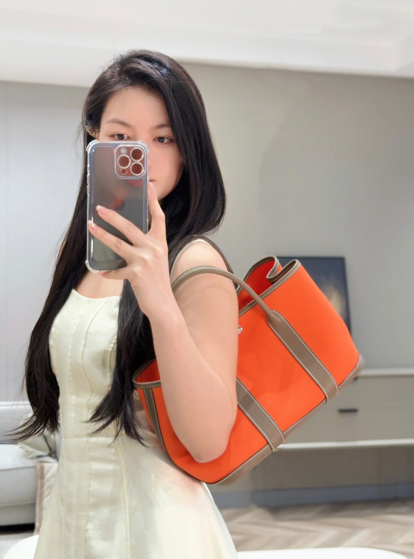 HERMES GARDEN PARTY 30CM IN ORANGE MINIMUM TOILETS COTTON CANVAS AND BROWN CALFSKIN