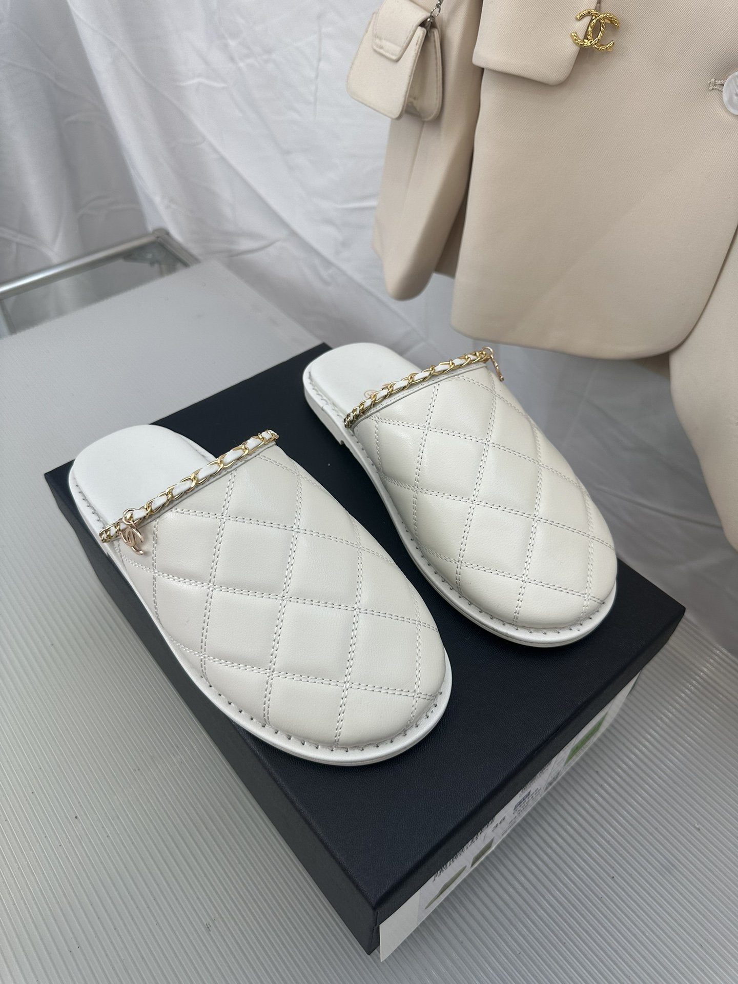 CHANEL White Lambskin Gold Chain Mules