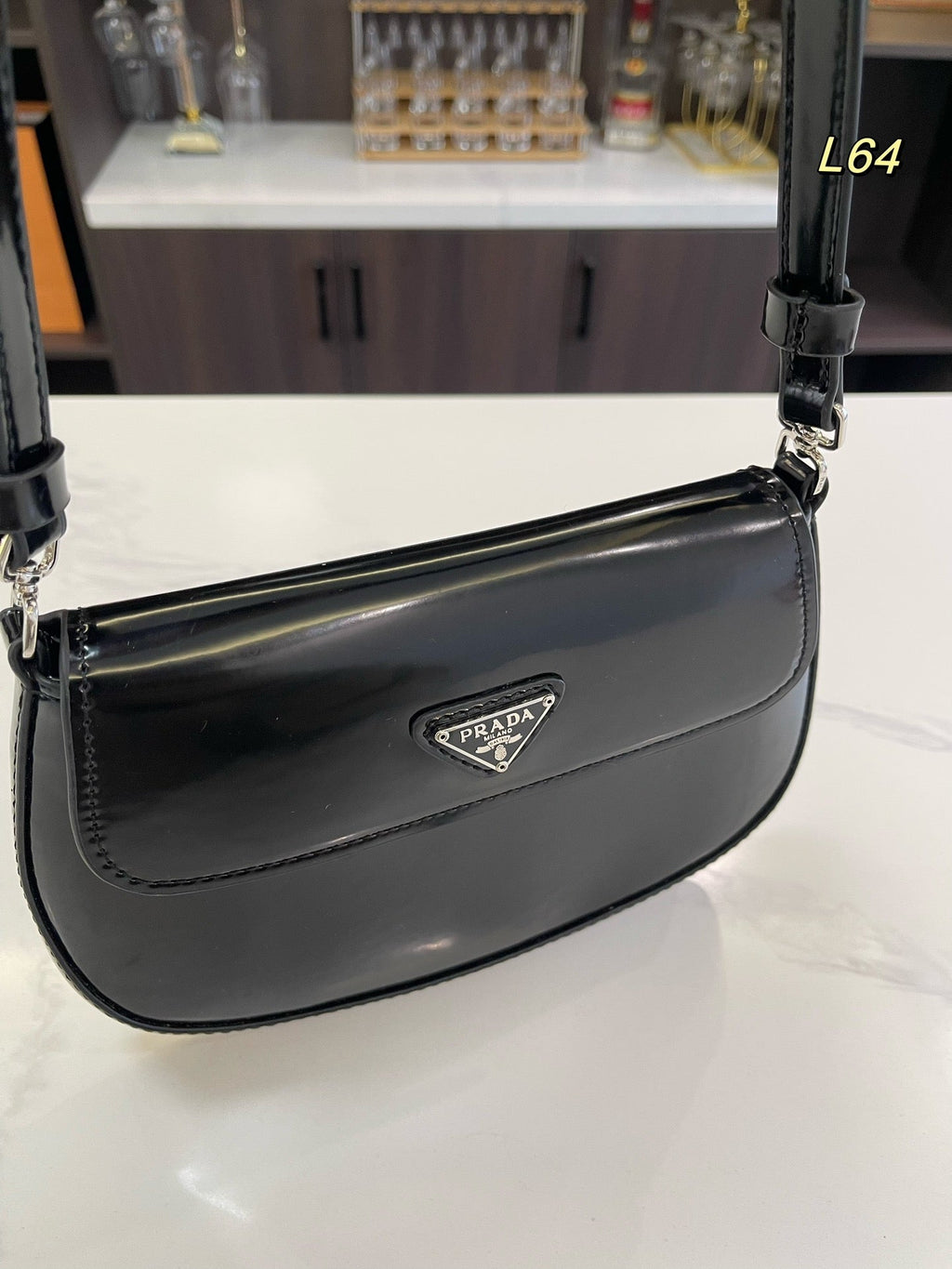 PRADA 25 CLEO FLAP SHOULDER BAG IN BLACK BRUSHED LEATHER