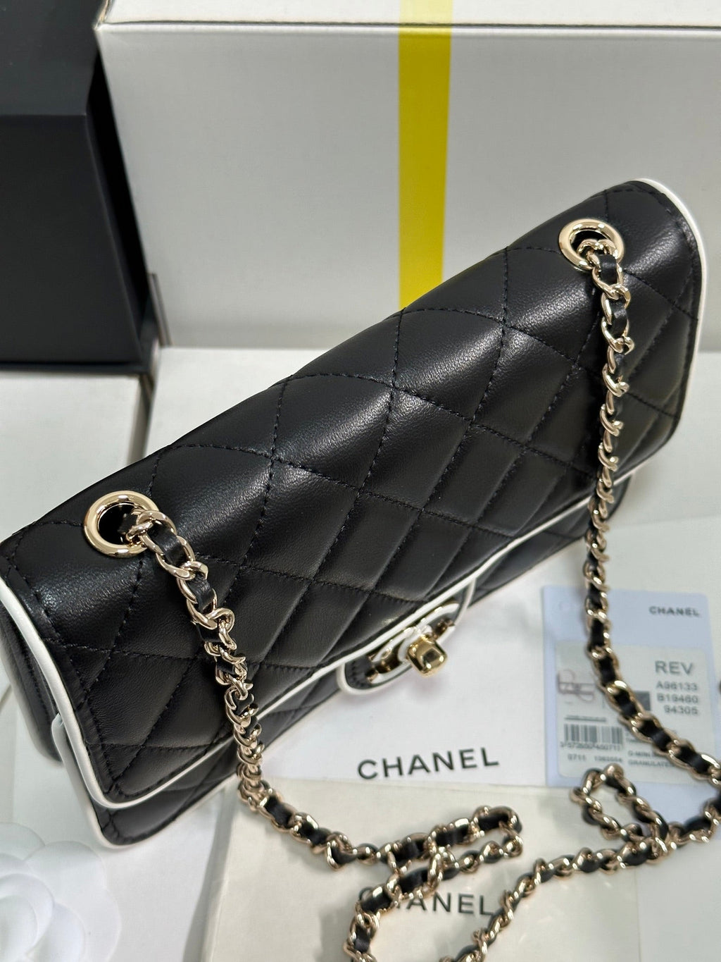 CHANEL QUILTED FLAP BAG WITH WHITE TRIM 19 IN BLACK LAMBSKIN