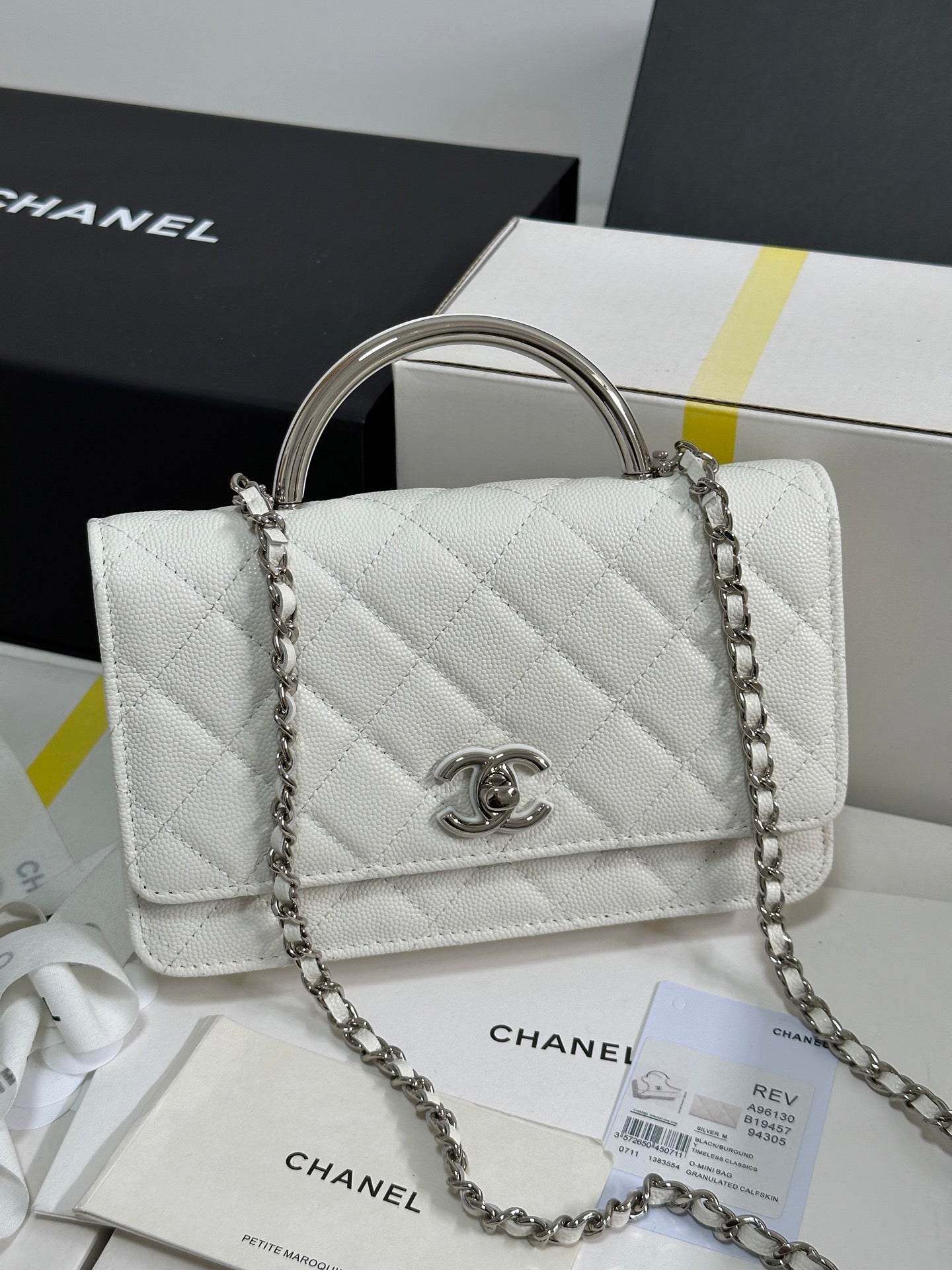 CHANEL FLAP BAG WITH SILVER-TONE HANDLE 19 IN WHITE CAVIAR SKIN