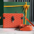CASSETTE TRUNK BAG 21 IN RED GOYARDINE CANVAS & CLAMECY COWHIDE