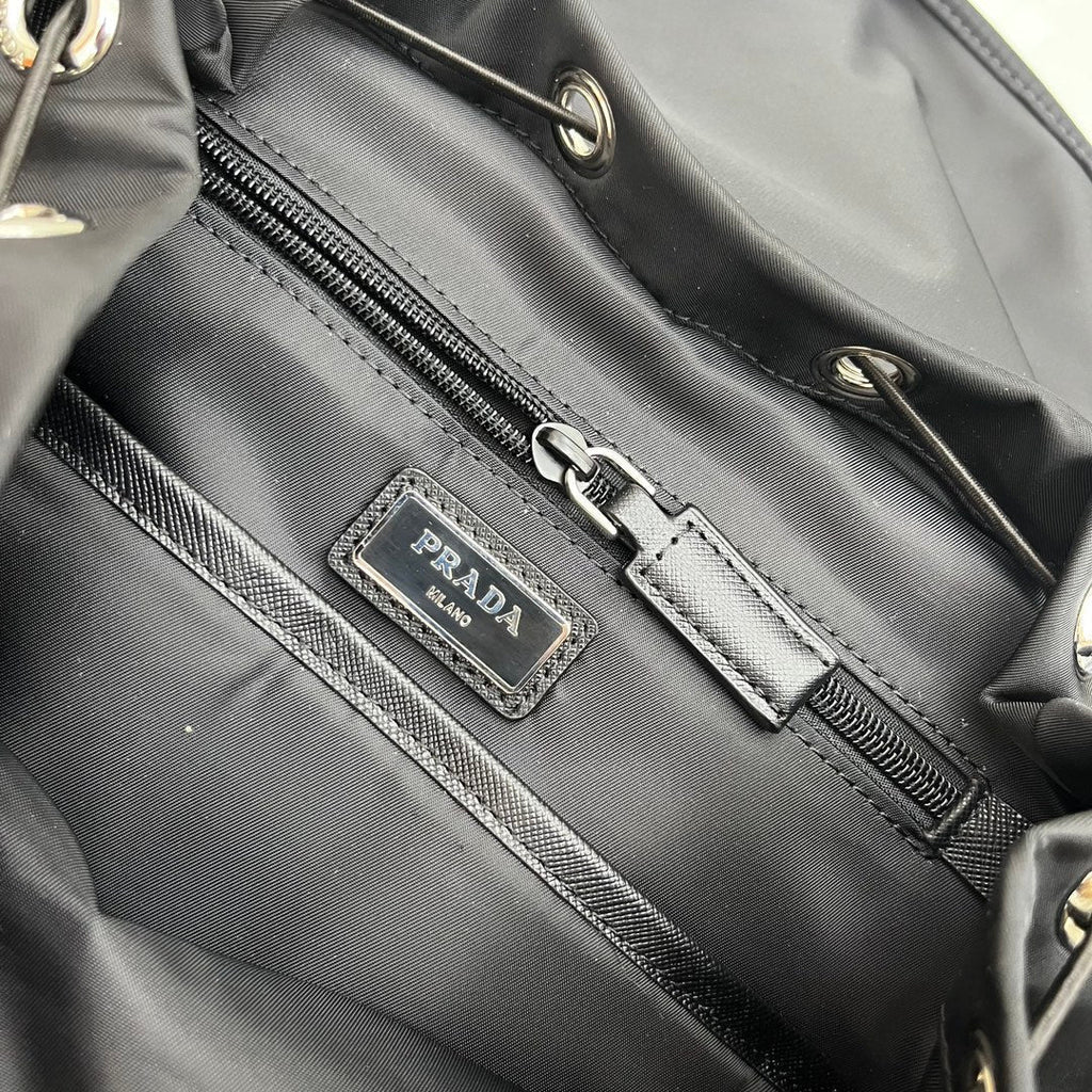 PRADA BACKPACK 45 IN BLACK RE-NYLON AND SAFFIANO LEATHER TRIM