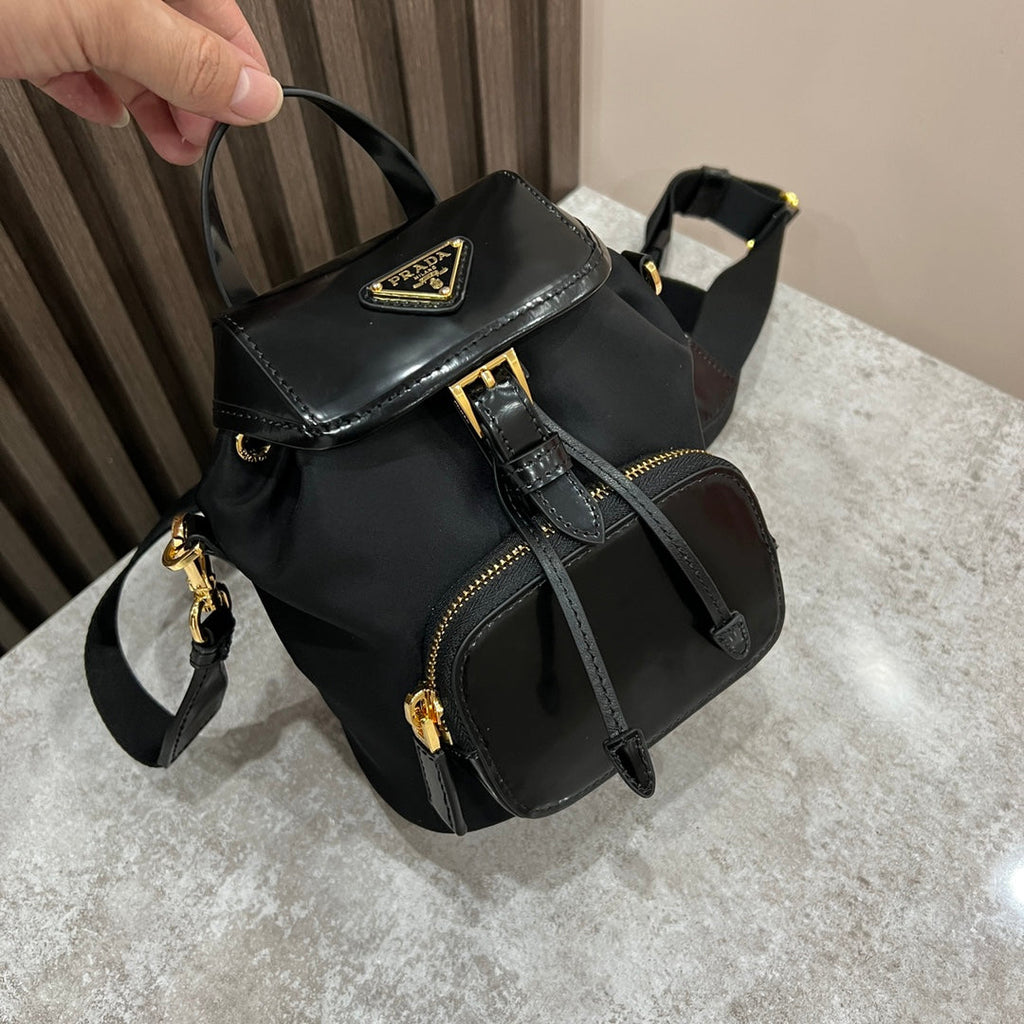 PRADA MINI BACKPACK 18 IN BLACK RE-NYLON AND GLOSSY CALFSKIN GOLD HARDWARE