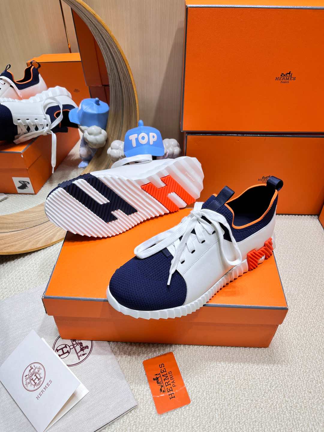 HERMES DEPART SLIP-ON SNEAKER IN NAVY BLUE KNIT AND WHITE CALFSKIN