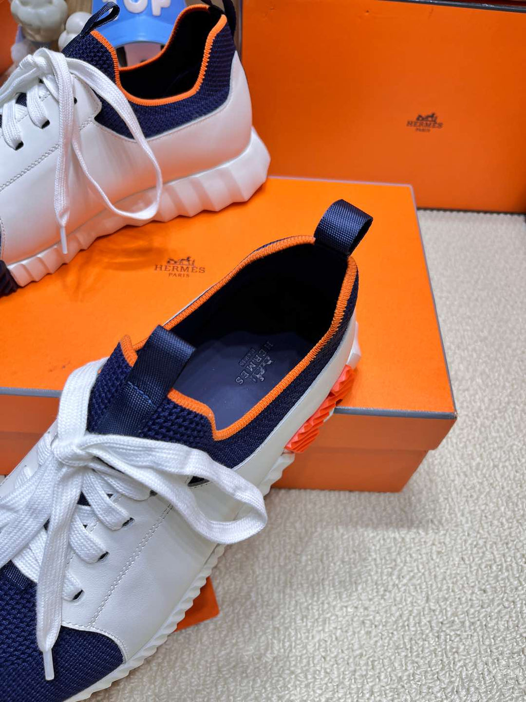 HERMES DEPART SLIP-ON SNEAKER IN NAVY BLUE KNIT AND WHITE CALFSKIN
